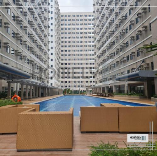Bazén v ubytování Homely - SMDC Green 2 Residences, Dasmarinas City nebo v jeho okolí