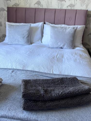 Ein Bett oder Betten in einem Zimmer der Unterkunft Black Isle View