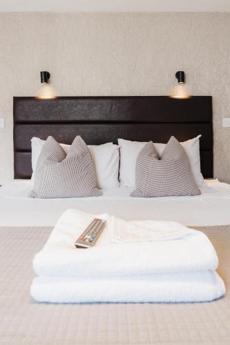 Ένα ή περισσότερα κρεβάτια σε δωμάτιο στο Design Suites Lytham