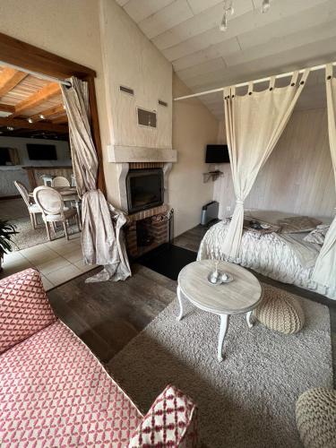 Гостиная зона в La maisonnette de Cancan