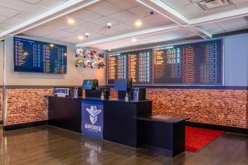 a baseball scoreboard is on the wall in a room at Grand Z Hotel Casino by Red Lion Hotels in Central City