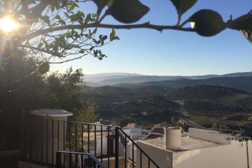 a view of the mountains from a balcony of a house at Mirador del Olivar in Olvera