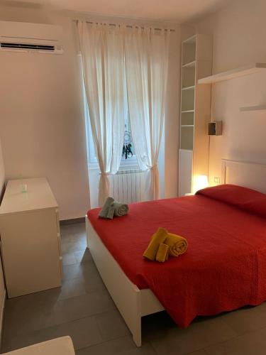 Il Giardino Nascosto tesisinde bir odada yatak veya yataklar