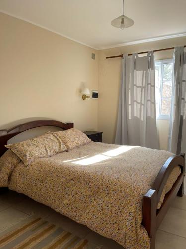 Llit o llits en una habitació de Casa moderna en zona tranquila