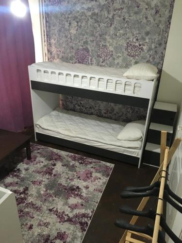 a bunk bed in a room with a wall at Hostel Taksim in Istanbul