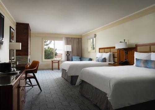 Una cama o camas en una habitación de Hotel Abrego
