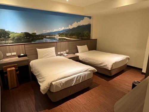 Ліжко або ліжка в номері CHIILIH HOTEL- Su ao