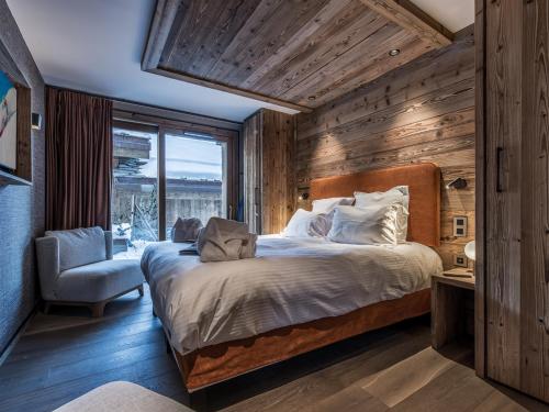 Appartement de luxe avec accès ski aux pieds, spa, terrasses ensoleillées et services hôteliers inclus - FR-1-613-61