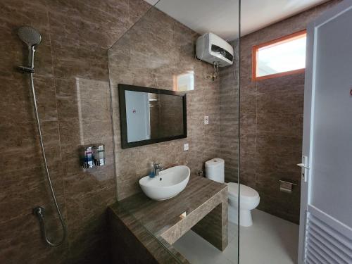 Koupelna v ubytování Hepi Yuk Ubud Luxury Guesthouse