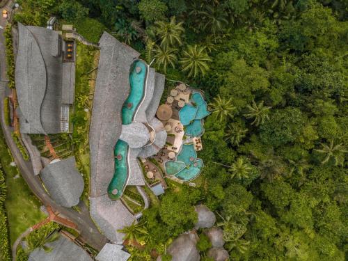 an overhead view of a resort with a swimming pool at Kanva Ubud in Tegalalang
