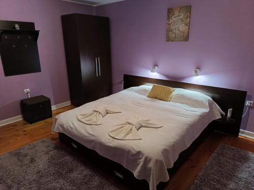 Łóżko lub łóżka w pokoju w obiekcie Cosy Apart Satu Mare