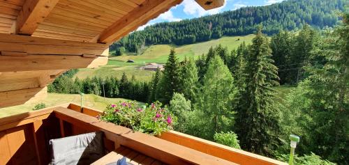 a balcony with a view of a mountain at Haus Enzian Apartments in Kartitsch