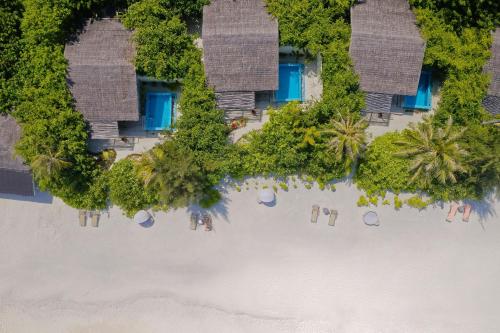 an aerial view of a resort on an island in the ocean at You & Me Maldives in Raa Atoll