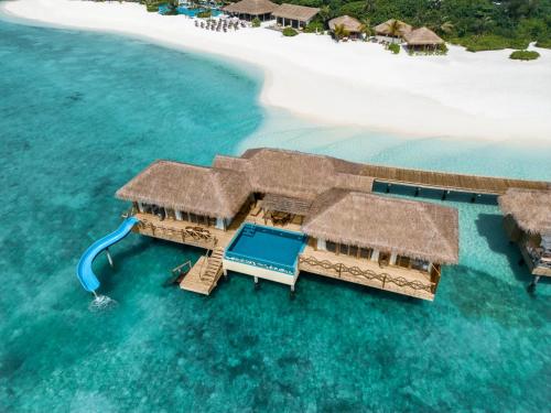 an aerial view of a resort on a beach at You & Me Maldives in Raa Atoll