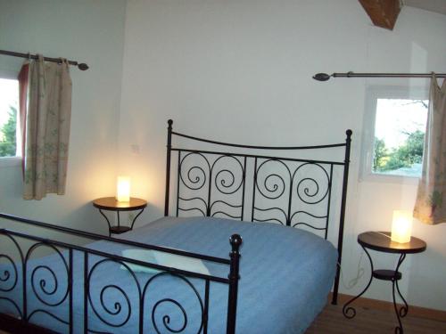 Katil atau katil-katil dalam bilik di Domaine La Fontaine Du Cade