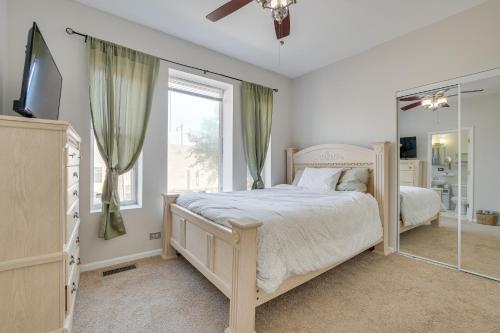 a bedroom with a large bed and a window at Chicago Condo Laptop Workspace, 6 Mi to Downtown! in Chicago