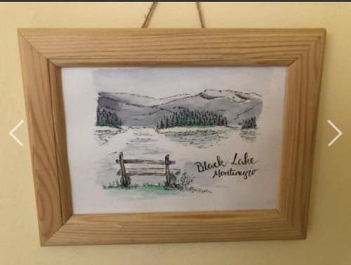 a picture of a picture of a bench in a picture frame at Apartment Žugić in Žabljak