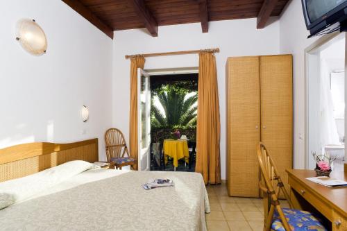 Katil atau katil-katil dalam bilik di Villa Angela Hotel & Spa
