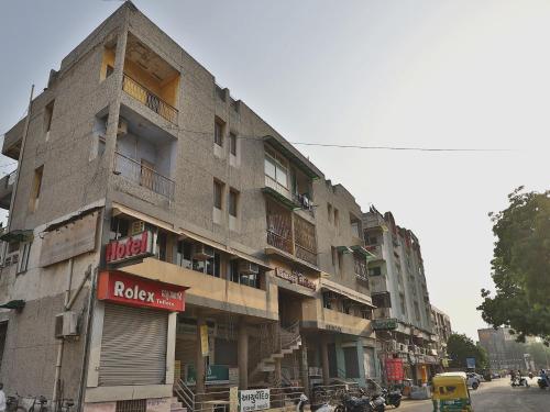 a building on the side of a city street at Hotel Maninagar Residency in Ahmedabad