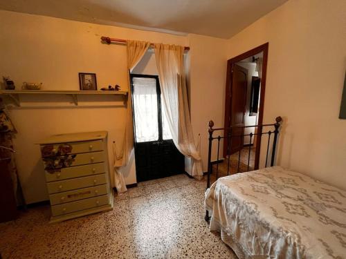 מיטה או מיטות בחדר ב-Casa Veracruz