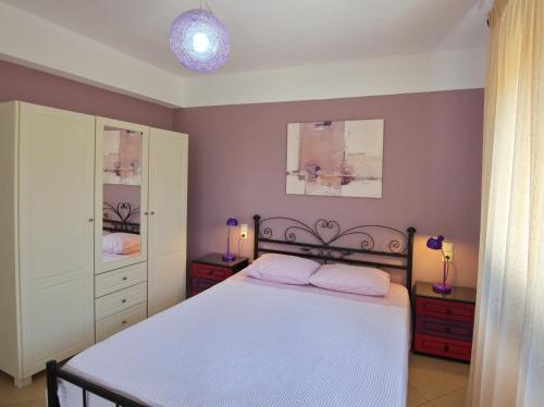Ένα ή περισσότερα κρεβάτια σε δωμάτιο στο Myrtilo cottage