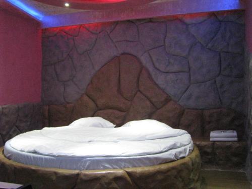 Кровать или кровати в номере Princ Plaza Hotel