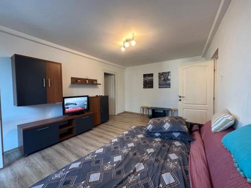 เตียงในห้องที่ Cozy Neversea Apartament