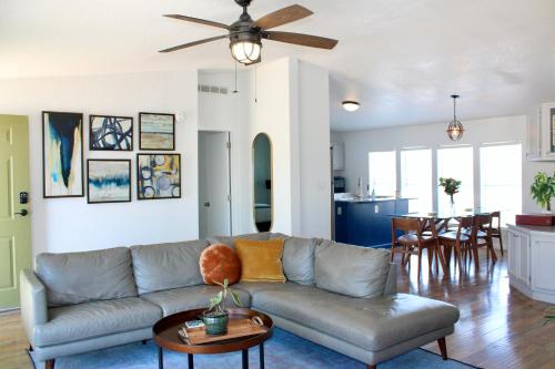 a living room with a couch and a table at Death Valley Hot Springs 3 Bedroom in Tecopa