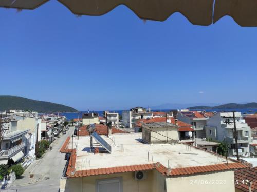 a view of a city from a building at ANNASHOUSE in Néa Péramos