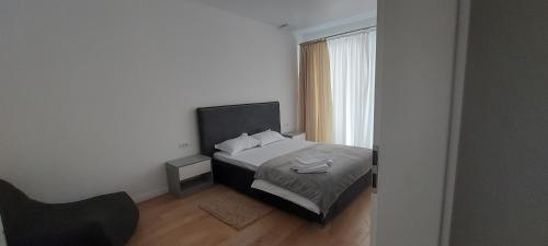 Un pat sau paturi într-o cameră la Apartament Derys