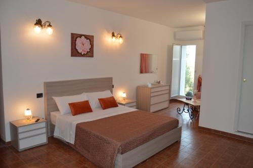 Postel nebo postele na pokoji v ubytování B&B Garden Grazia
