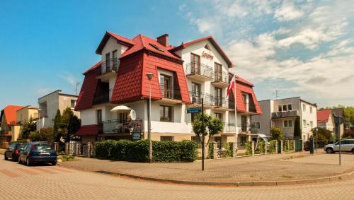 Pokoje Gościnne Sztorm nad morzem w Darłówku