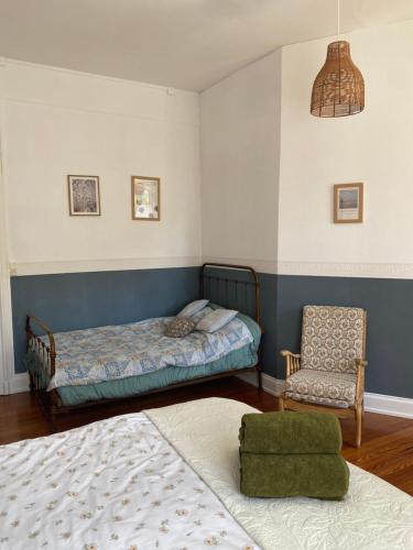 A bed or beds in a room at La Maison du Markstein