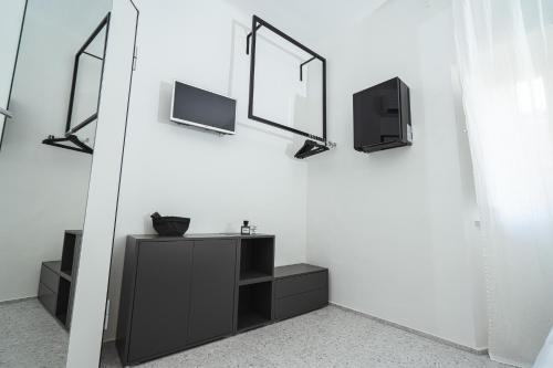 a bathroom with a sink and a mirror at Casa Valentina in Senigallia