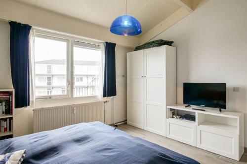 Postel nebo postele na pokoji v ubytování Beach Appartement 19 - Callantsoog