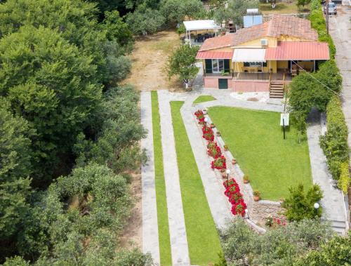an aerial view of a house with a garden at Xenophon House in Paleo Tsifliki