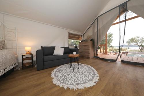 Posteľ alebo postele v izbe v ubytovaní AURAS - Glamping Eco Resort