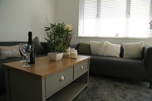 a living room with a couch and a coffee table at 408 Sea View Road in Bridlington