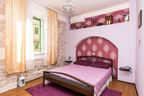 Кровать или кровати в номере Apartman Bella,ŠIBENIK,Croatia