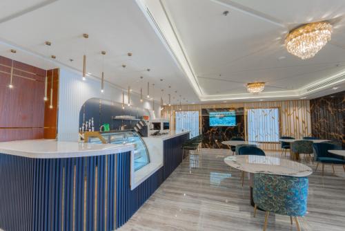 Posezení v ubytování Jawhrat Al Sharq Serviced Apartments