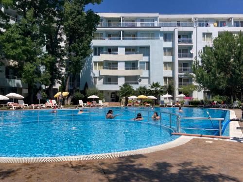 a large swimming pool in front of a building at YASSEN in Sunny Beach