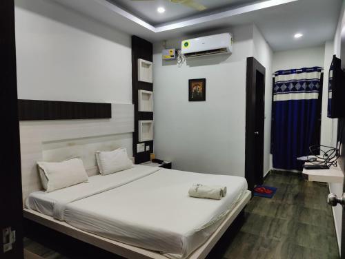 Ein Bett oder Betten in einem Zimmer der Unterkunft Hotel Cipron Inn
