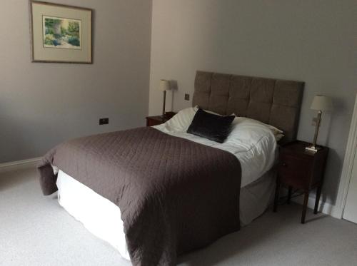 Ένα ή περισσότερα κρεβάτια σε δωμάτιο στο Charwelton Lodge