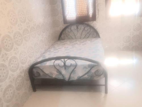 Ένα ή περισσότερα κρεβάτια σε δωμάτιο στο Zitouna Rooms