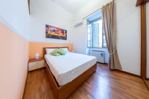 Giường trong phòng chung tại Trastevere - Viaggio a Roma Antica