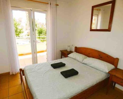 Postel nebo postele na pokoji v ubytování Vibrant central Albir pad