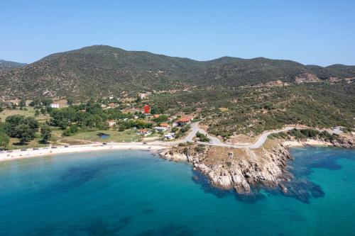 an aerial view of a beach and the ocean at Morfo Luxury Living in Sikia