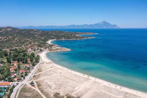 an aerial view of a beach and the ocean at Morfo Luxury Living in Sikia