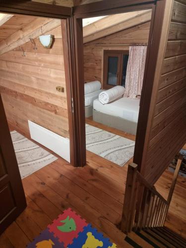 an inside view of a tiny house with a bed at Ayder Rainbow Gokkusagi in Ayder Yaylasi