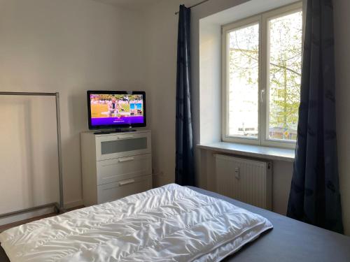 Katil atau katil-katil dalam bilik di Sueños Apartment